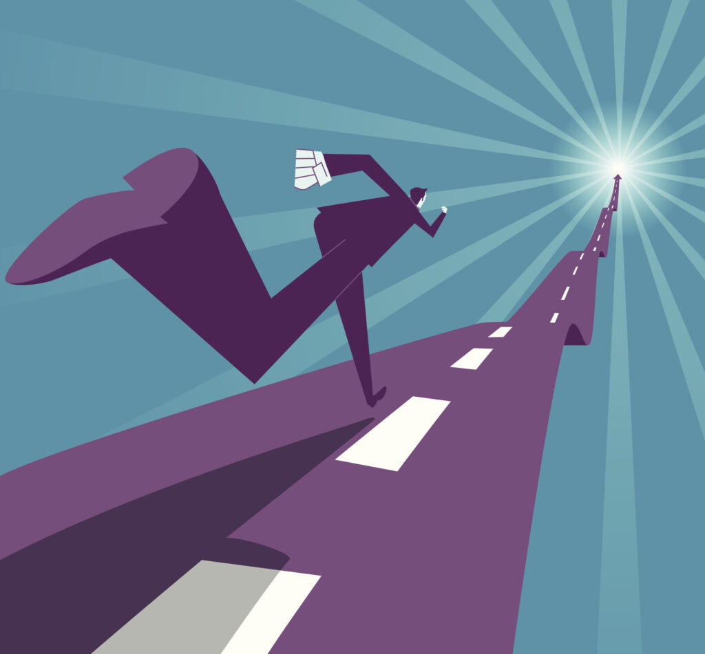 un hombre corre hacia la luz del éxito