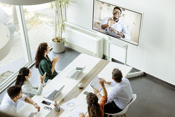 Reunión de trabajo híbrido. Teletrabajo